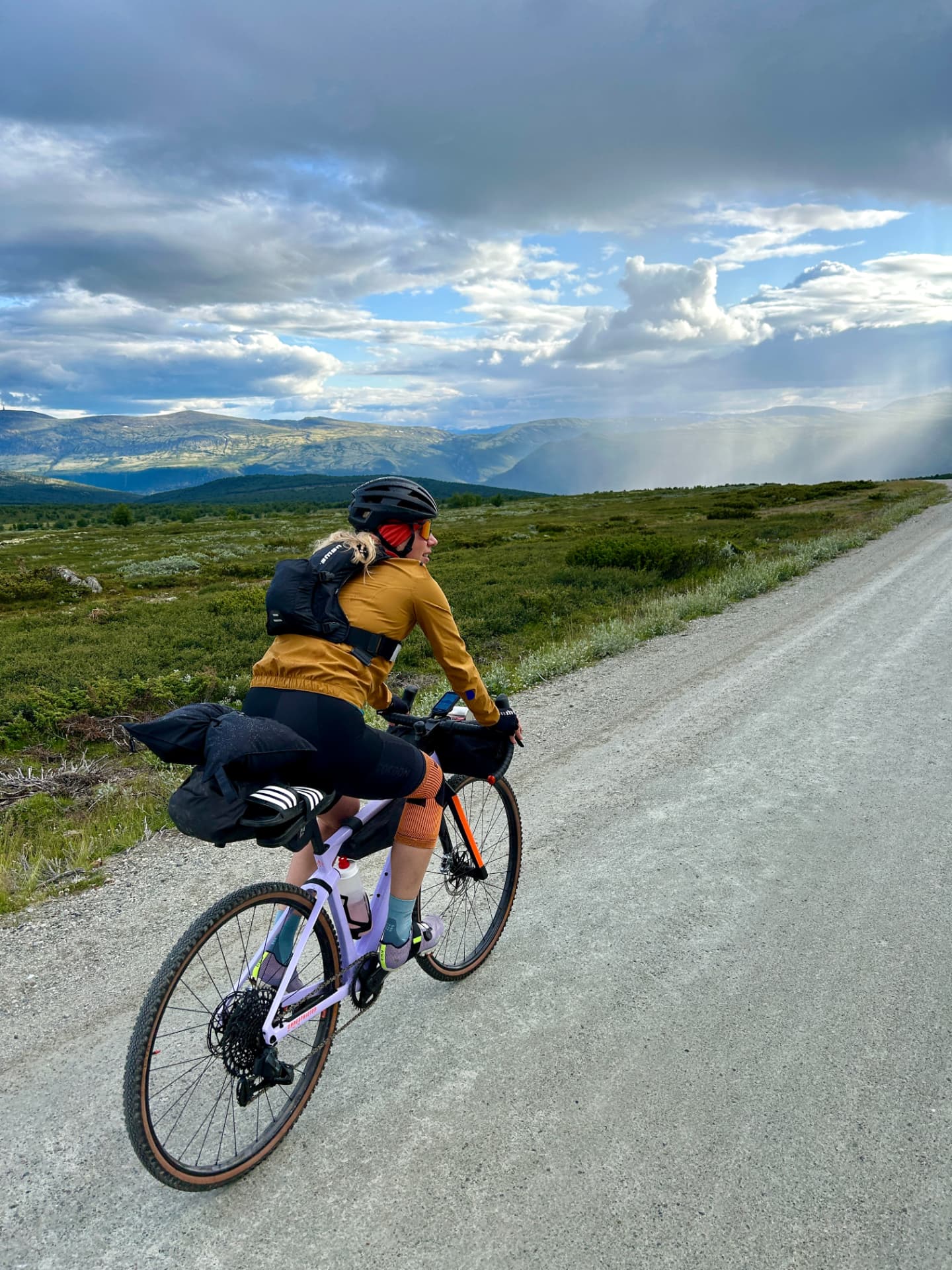 Amy bikepacking through the mountains